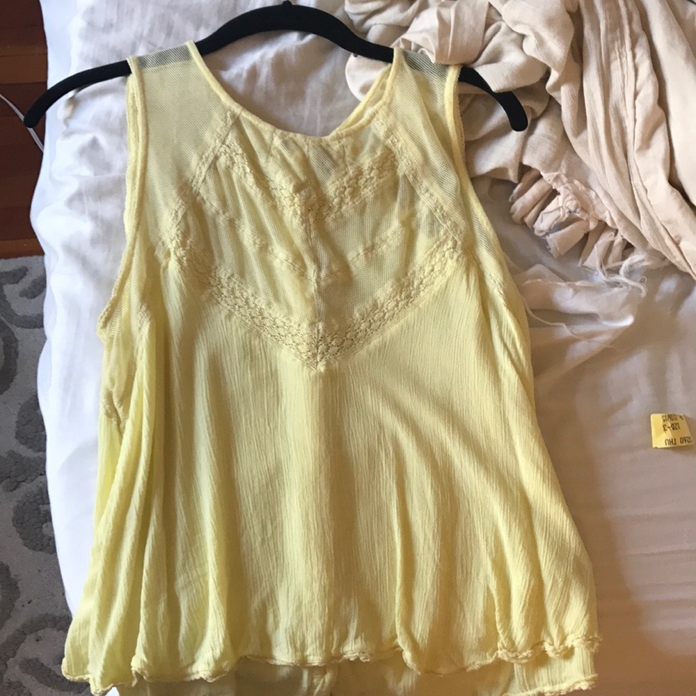 Yellow free people top. Maybe worn once at most